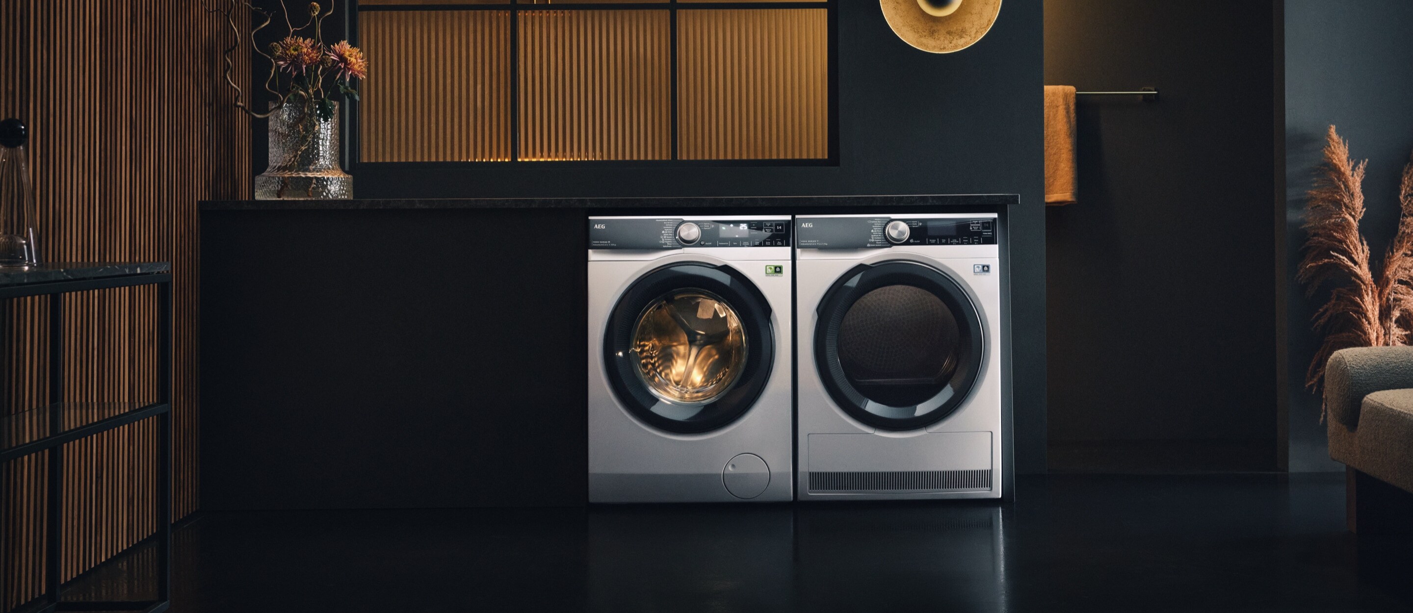 Woman sitting on washing machine